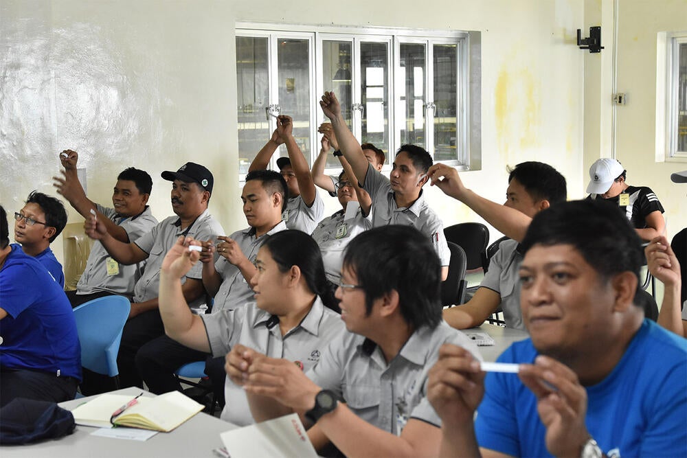 A lively discussion of engaged employees at Daiwa Seiko Philippines Corp.  during a family planning information session. © UNFPA Philippines