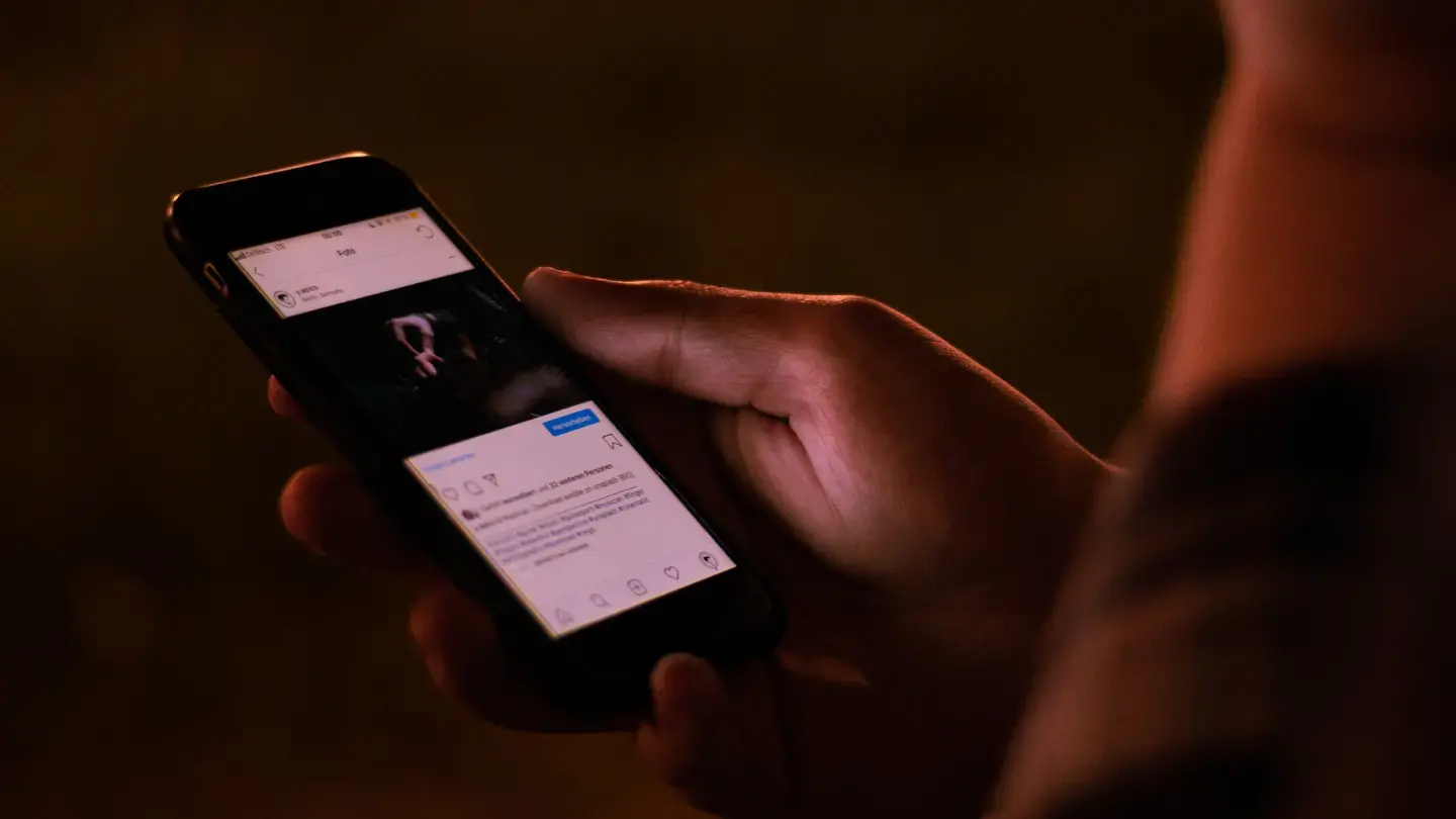 Close up photo of a person using their phone